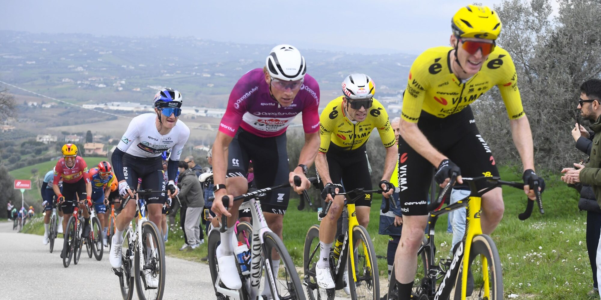 Wout van Aert and Mathieu van der Poel leading group on climb at Tirreno-Adriatico