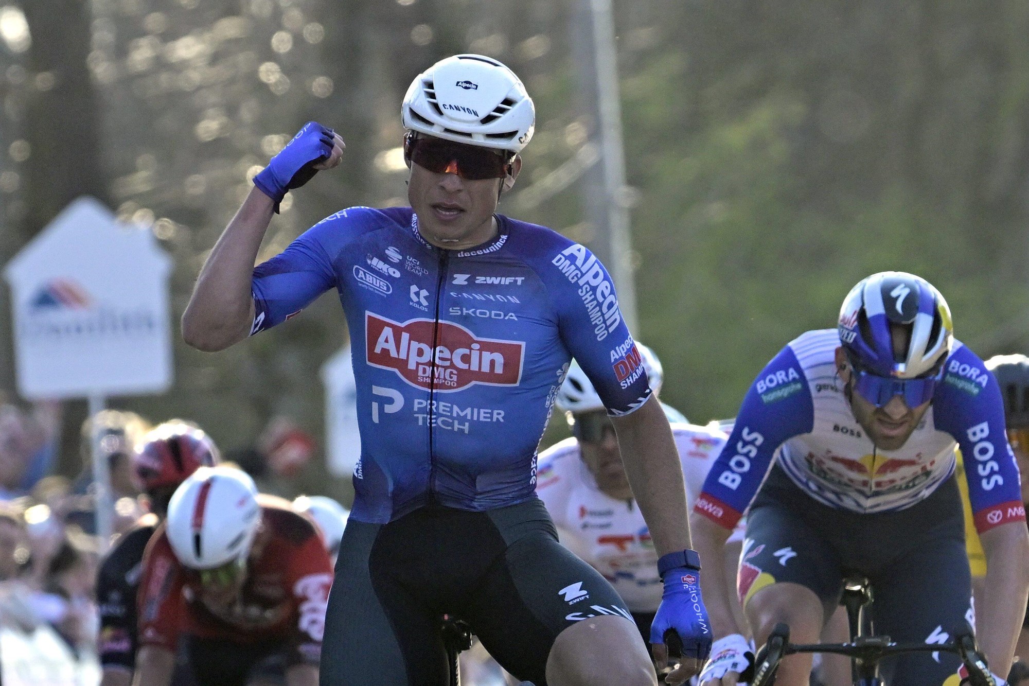 Jasper Philipsen wins sprint at Nokere Koerse in Alpecin-Premier Tech blue jersey