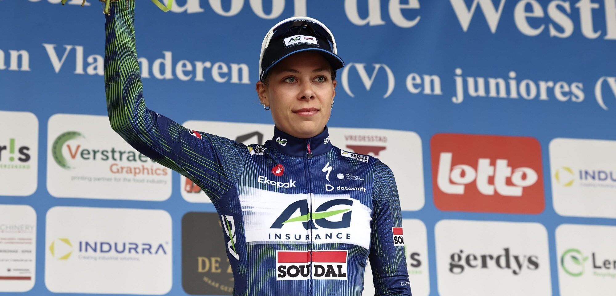 Shari Bossuyt on podium at Dwars door de Westhoek in AG Insurance-Soudal Team jersey