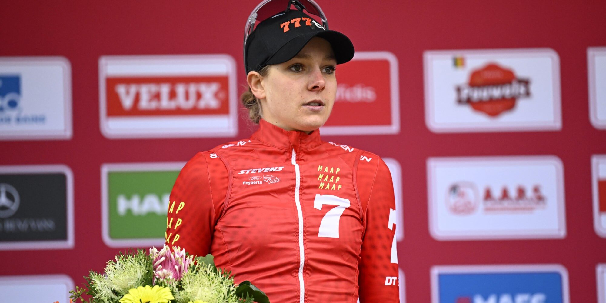 Aniek van Alphen on podium in red jersey at UCI Cyclocross World Cup Namur