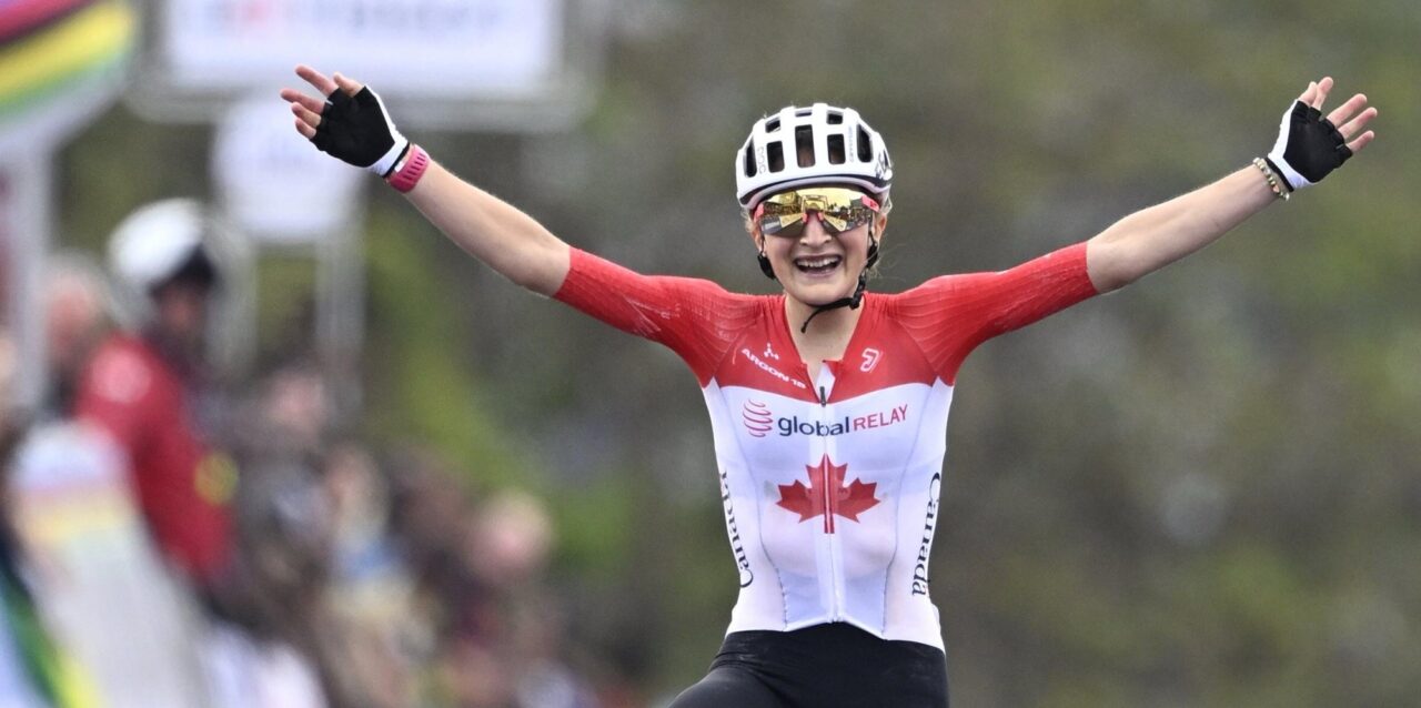 Vallieres Mill celebrating finish at UCI Road World Championships in Canadian jersey
