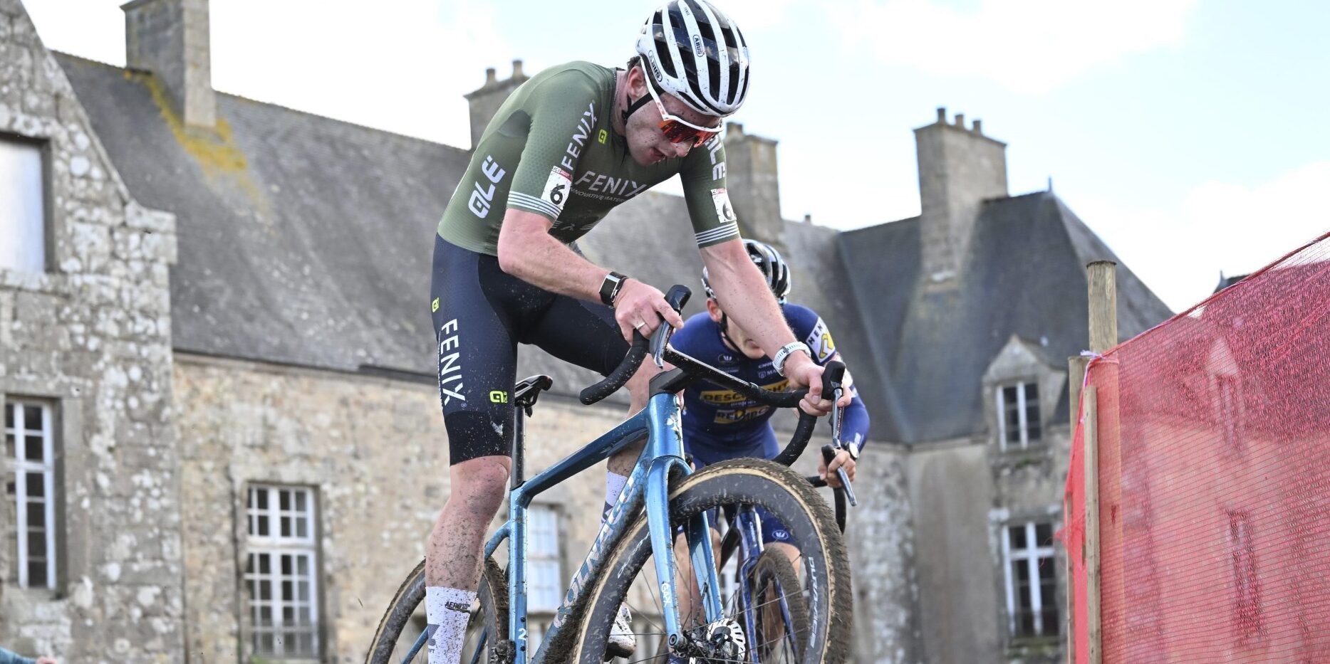 Ryan Kamp racing cyclocross in Fenix-Deceuninck kit at UCI World Cup Flamanville