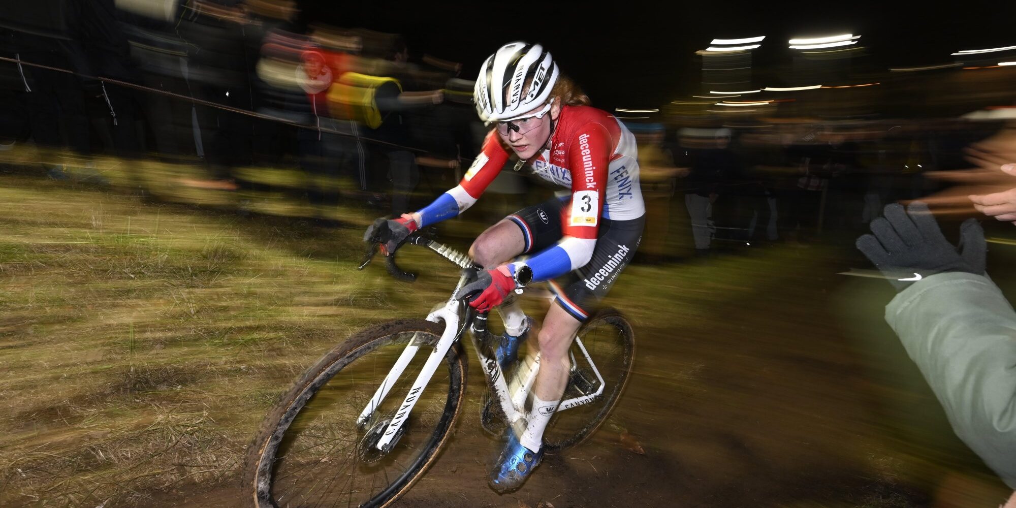 Puck Pieterse racing in Dutch national champion jersey at Superprestige Diegem cyclocross